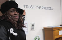 Wanda-Meta-House-graduate-points-at-Trust-the-Process-during-Digital-Advocacy-Workshop