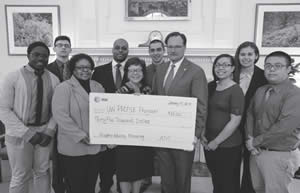 AT&T Wisconsin announced a $35,000 donation today to support UW-Madison’s PEOPLE program to help students successfully prepare for and complete higher education. Pictured (L-R) are: student Tofe Salako, student Luis Rodriguez, Jacqueline DeWalt, director of the PEOPLE program; Patrick Sims, interim vice provost for diversity and climate; UW-Madison Chancellor Rebecca Blank, student Gustavo Zach Vargas, AT&T Wisconsin State President Scott T. VanderSanden, and students Aisha Hill, Lakita Maulson and Anousone Bounke. Students Salako, Hill and Bounke are from Milwaukee.