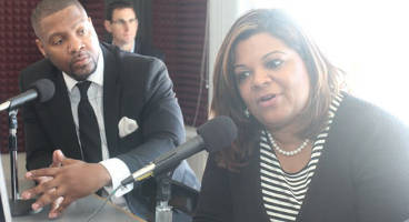 Tyra Metoyer, of the American Petroleum Institute speaks to WNOV AM Radio host Sherwin Hughes as former State Rep. Jason Fields listens. (Photo by Robert A. Bell)