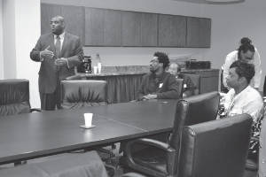 Youth and Poverty Task Force Co-Chair Dr. Demond Means outlines the goals of the group to Task Force members.