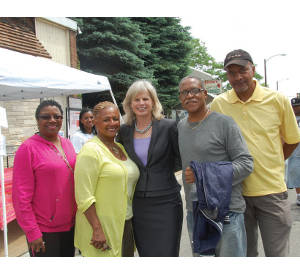 Mary Burke celebrating Juneteenth Day with parade goers