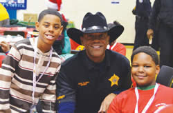 Milwaukee-County-Sheriff-David-A-Clarke-shares-day-with-local-children-Shop-with-a-Cop-day.jpg