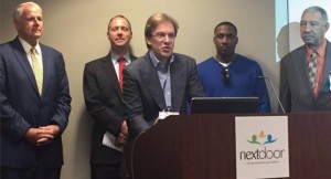 From left to right, Mayor Tom Barrett, Child Support Services Director Jim Sullivan, County Executive Chris Abele, Khalid Crockerhan, and My Father’s House Inc. President and CEO Albert Holmes. Photo by Ariele Vaccaro.