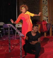 Selena McKnight plays a young girl struggling in the aftermath of molestation. Pam McFarling performs a dance onstage beside her. Photo by Ariele Vaccaro.