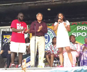 Milwaukee’s 5th District Supervisor Marcelia Nicholsan (middle) greets the crowd on Juneteenth (Photo by Mrinal Gokhale).